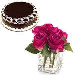 Chocolate Cake With Pink Roses In Glass Vase