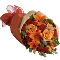 Regal Bouquet ofMixed Flowers in Red and Orange Shades<br>
