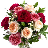 A fresh mixed roses in red, cream, pink and pink with red Rosensstrau, cremef.,...