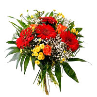 Color: red - orange<br>This colorful and round tied bouquet is tied with orange ...