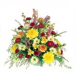 An elegant and unforgettable expression with lillies, gerberas, chrysants and sa...