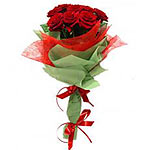 This elegant arrangement will catch their eye with its array of red roses. This ...