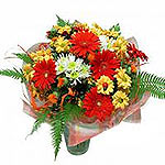 As sweet as your thoughts, this delightful arrangement of Roses, mini gerberas a...