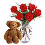 Send hugs and lasting memories to your soulmate with this bouquet of roses and s...