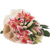 Pink Lily Bouquet with Palm Leaves. A perfect pink lily bouquet handtied with st...