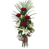 Intense and powerful red roses combined with pure and innocent white lilies, mak...