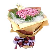 Eye-Catching Bunch of 11 Pink Roses with a Little Bear