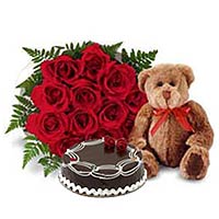 Beautiful Combo of Red Roses, Chocolate Cake and a Cute Bear 