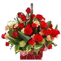 Romantic Display of Roses and Carnations in a Basket