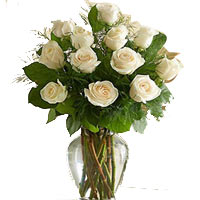 Blossoming Display of 12 White Roses in a Glass Vase