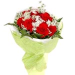 Pristine Bouquet of 12 Red Roses with Green Leaves