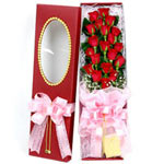 Seasonal Display of Twelve Red Roses in a Box