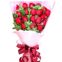 19 red roses and  green leaves with a beautiful paper. The rose is a classic way...