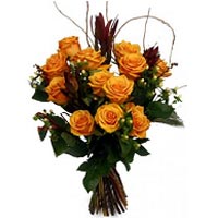 Classical bouquet of 19 roses in orange, with a length of 50 cm, served with gre...