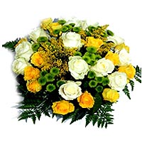 Bright and rich bouquet of yellow and white roses, chrysanthemums, etc. which in...