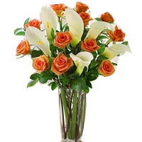 Bouquet of white and orange Roses and Lilies....