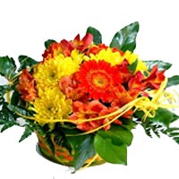 Brightly colored spring flower arrangements Basket....