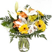 Bouquet of different white, yellow and orange flowers....
