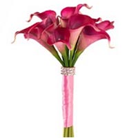 A stylish bouquet of calla and freesia. Decorated with green leaves and pearls....