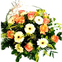 A beautiful and delicate flower basket, light pink and cream roses and minigerbe...