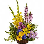 Flower basket of lilies and other flowers...