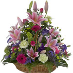 Basket of roses, lilies and carnations ...