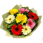 A pretty collection of mix flowers beautifully arranged with fillers n  leaves. ...
