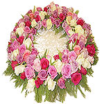 Express your deepest sympathy during this difficult time with this wreath. A tho...