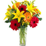 Fill the day with brightness with this lovely bouquet of lilies, roses carnatios...