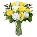 There is nothing more lively than this beautiful arrangement of fresh yellow n w...