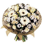 A simple soft bouquet of Cala flowers along with other white flowers to expess u...