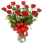 Exotic bouquet of beautiful red roses accompanied by pretty ribbons  just for u ...