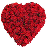 Thousands of words through a bunch of 80 red roses. This heart shaped arrangemen...