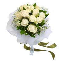 Say I do with our most pure 12 white roses, that express sympathy, remembrance a...