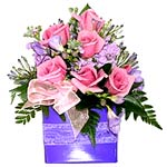 Seasonal flowers in pretty pinks and mauves arranged into a flower box. Very eas...