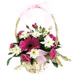 Cute seasonal flowers arranged into a small flower basket. Lovely gift for most ...
