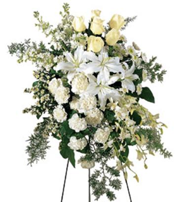 Funeral round arrangement of white and yellow flowers...