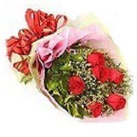 Celebrate all flavors of love with this elegant arrangement of 7 red roses mixed...