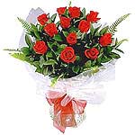 An Endearing Twelve Red Rose Bunch Swathed Beautifully along with White Michel a...