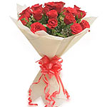 Delight someone special with a beautiful bouquet of 15 Roses, red and let this p...