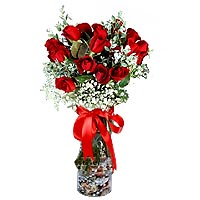 The stylish glass vase of 20 red roses....