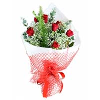 Love Offer Red Roses. This bouquet is composed of 7 red roses with greens....