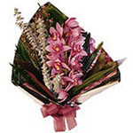 A selection of seasonal fresh cut flowers with the addition of attractive wrappi...
