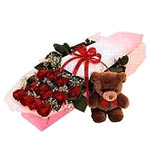 Fine box with gorgeous fresh roses plus a tendy-bear. It 's really a very partic...