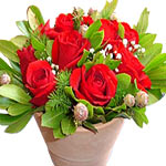 A contemporary presentation of red roses with mix foliage. Its simply the right...