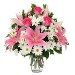 Send this beautiful vase of  pink lilies, roses an...