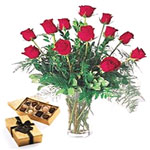 Exclusive combo of vase of red roses  and chocoalt...