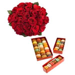 Combo of red roses in a box of mouthwatering macar...