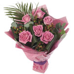 Six Pink Roses delivered beautifully arranged with fillers and greenery....