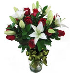 One Dozen Red Roses & Lily Mix<br>12 Red Roses & Lily Mix in a classic glass vas...